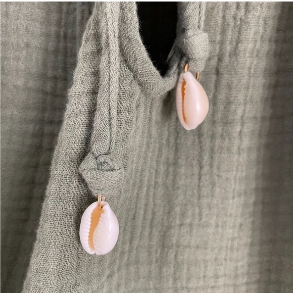 Calligraphie Women Medium
Green Seashell Tie Swing Tank Top
Sleeveless Shirt - Picture 2 of 9